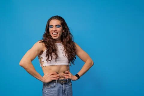 Non-binary stylish person smiling very happy Stock Photos