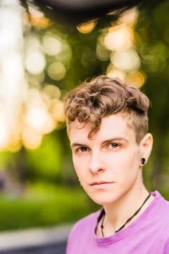 Non-binary trans lifestyle gender expression androgynous headshot portraint Stock Photos