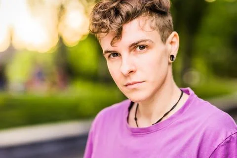 Non-binary trans lifestyle gender expression androgynous headshot portraint Stock Photos