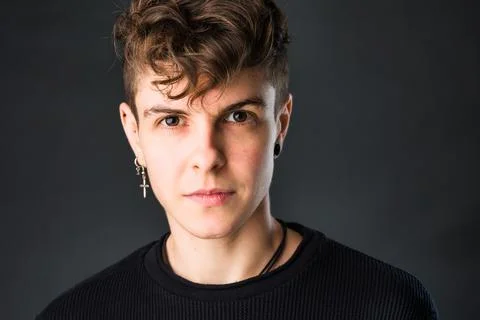 Non binary transgender business headshot from a mid hispanic androgynous Tomboy Stock Photos