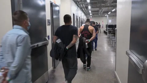 Non-citizens arrive at U.S. Customs and Border Protection Ursala Facility Stock Footage 240191124