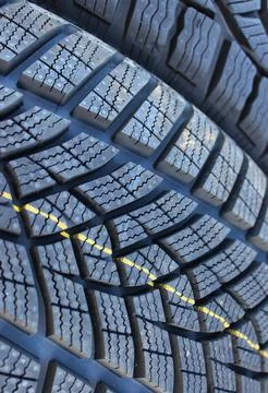 Non Studded Tires Tread Pattern Extreme Closeup View Foto stock
