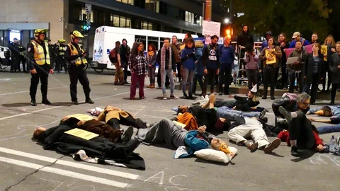 Non-violent protesters in the street Stock Footage 120039475