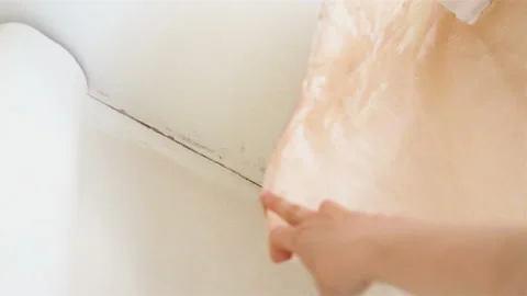 Non-woven Wallpaper and the ceiling in the corner of the house was covered with Stock Footage 109063975