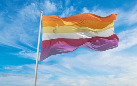 Nonbinary lesbian pride flag waving in the wind at cloudy sky. Freedom and lo Stock Illustration