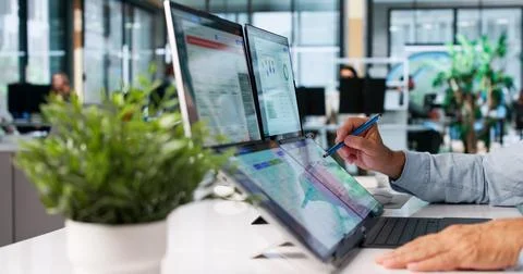 Nonprofit Manager Analyzes Donor Data On Laptop For Strategic Fundraising Pla Stock Photos