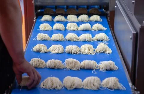 Noodle making machine Stock Photos