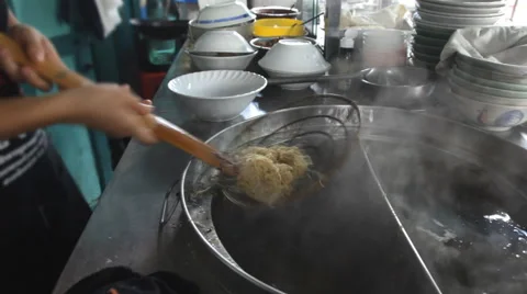 Noodle preparing in restaurant Stock Footage 60110379