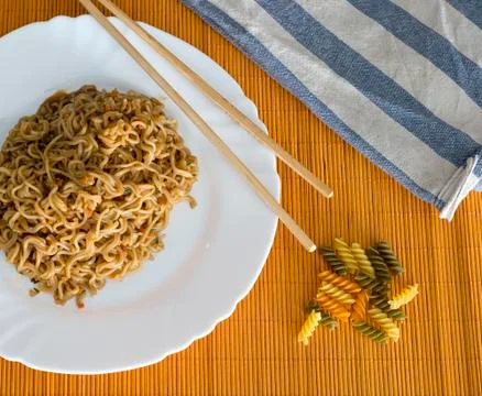 Noodles with beef in rectangle plate with bamboo stic Stock Photos