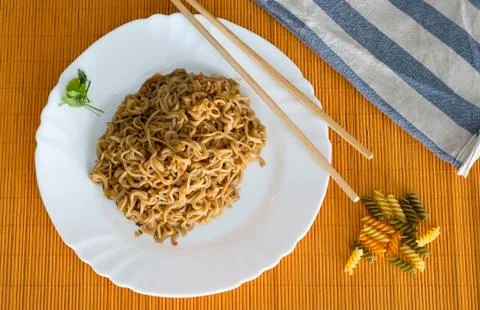 Noodles with beef in rectangle plate with bamboo stic Stock Photos