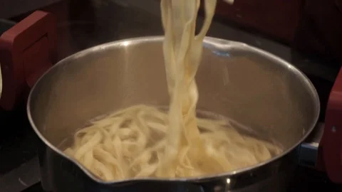 Noodles in a boiling water Stock Footage 113527219