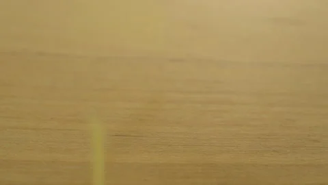 Noodles fall on a wooden surface. Macro shot of pasta. Slow motion. Video stock 135236375