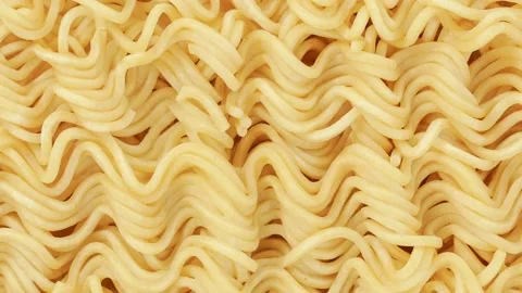 Noodles instant, raw, not cooked, briquette Stock Footage 228808947
