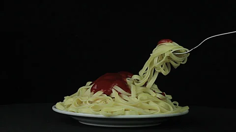 Noodles rotates on a black background Stock Footage 35126102