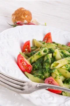 Noodles with spinach Stock Photos