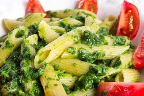 Noodles with spinach Stock Photos