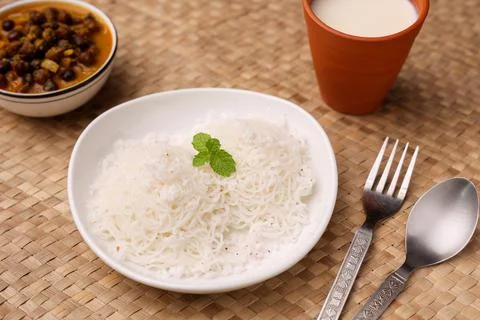 Noolappam , idiyappam rice noodles string hopper Kerala breakfast Stock Photos