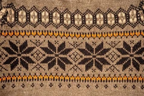 Nordic Knitted Pattern Background. Texture Christmas sweater Stock Photos