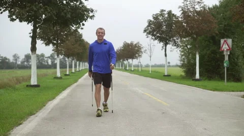 Nordic walking slow motion on cloudy day Stock Footage 41832918