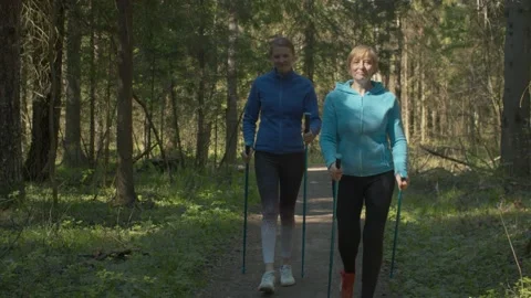Nordic walking in spring forest Stock Footage 131393889