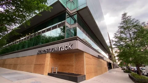 Nordstrom Rack is boarded up during the George Floyd Protests in Washington, DC Stock Footage 131905314
