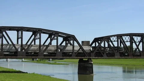 Norfold Southern train crossing a large bridge Stock Footage 90679487