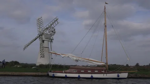 Norfolk Broads with windmill and boating holidays in England UK 4K Stock Footage 170110318