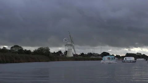 Norfolk Broads with windmill and boating holidays in England UK 4K Vídeos de archivo 170165668
