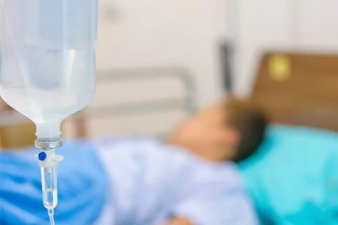 Normal saline solution or sodium chloride with infusion bottle drip for pat.. Stock Photos