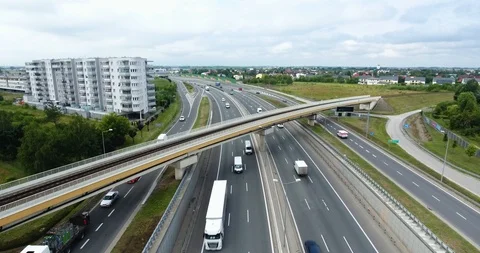 Normal Traffic Flow. Highway And Railway Intersection Stock Footage 92797513