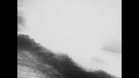 NORMANDY - 1944 - Aerial view of various railway lines, trains exploding due to Video stock 327753288