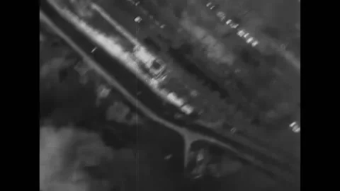 NORMANDY - 1944 - B-17s drop bombs over their targets near Normandy before Stock Footage 312794806