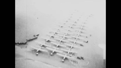 NORMANDY - 1944 - Lines of Douglas C-47 Skytrain military transport aircraft are Stock Footage 327744467