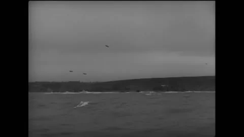 NORMANDY - 1944 - A US Navy rescue boat sails towards Normandy, France on D-Day Stock Footage 254192229
