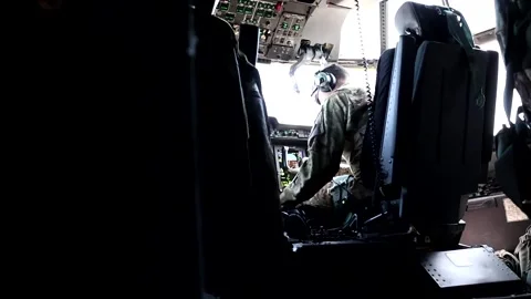 NORMANDY - 6.2.2024 - USAF Special Tactics Airmen perform a freefall jump in Stock Footage 288192011