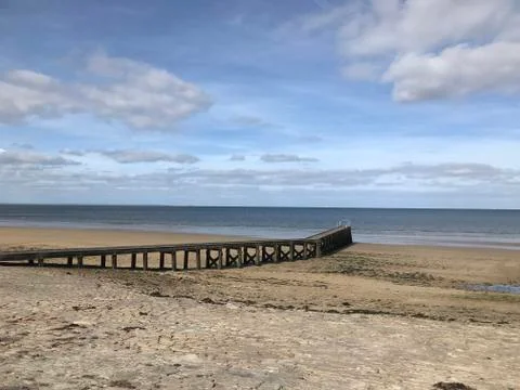 Normandy beach with jetty Stock Photos