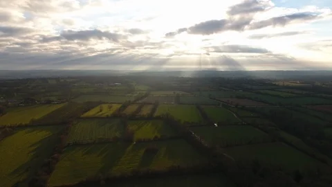 Normandy fields separated by hedges and ditches sunset time with clouds. Aerial  Vidéo 100486947