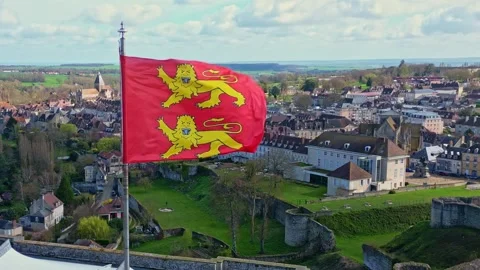 Normandy flag waving in the wind with Falaise city in background, Normandy Stock Footage 310219094
