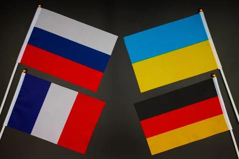 Normandy four meeting. Normandy format summit. Flags of Ukraine, Russia Stock Photos