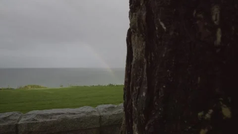 Normandy, France. 11-01-2023. Rainbow in the sky, maritime landscape. Panning 4K Stock Footage 259476853