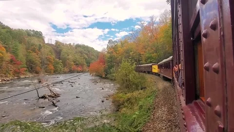 NORTH CAROLINA - Train Passing By a River on Autumn Season Stock Footage 213599870