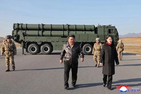 North Korea test fires large-caliber multiple rocket launcher system, Undisclose Stock Photos