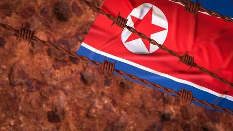 North Korean Flag Behind Rusty Barbed Wire Barrier 3d render. Stock Illustration
