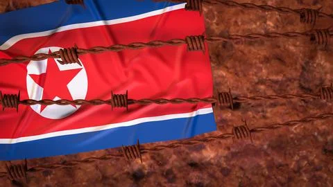 North Korean Flag Behind Rusty Barbed Wire Barrier 3d render. Stock Illustration