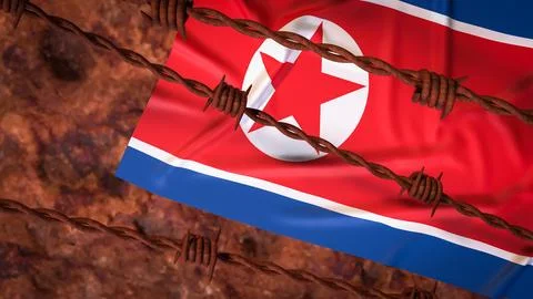 North Korean Flag Behind Rusty Barbed Wire Barrier 3d render. Stock Illustration
