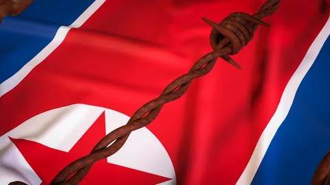 North Korean Flag Behind Rusty Barbed Wire Barrier 3d render. Stock Illustration