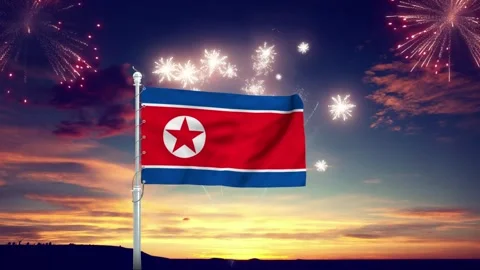 North Korean flag waving motion with celebratory fireworks footage Stock Footage 342369599
