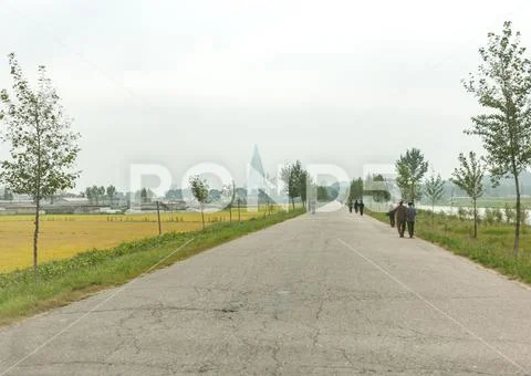 North Korean people along a rural road in the countryside, Pyongan Province, Stock Photos