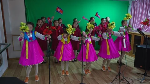 North Korean School Performance with Flag Dance in Rason 库存影片 311284441