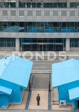 North Korean soldiers standing in front of the United Nations conference room Stock Photos
